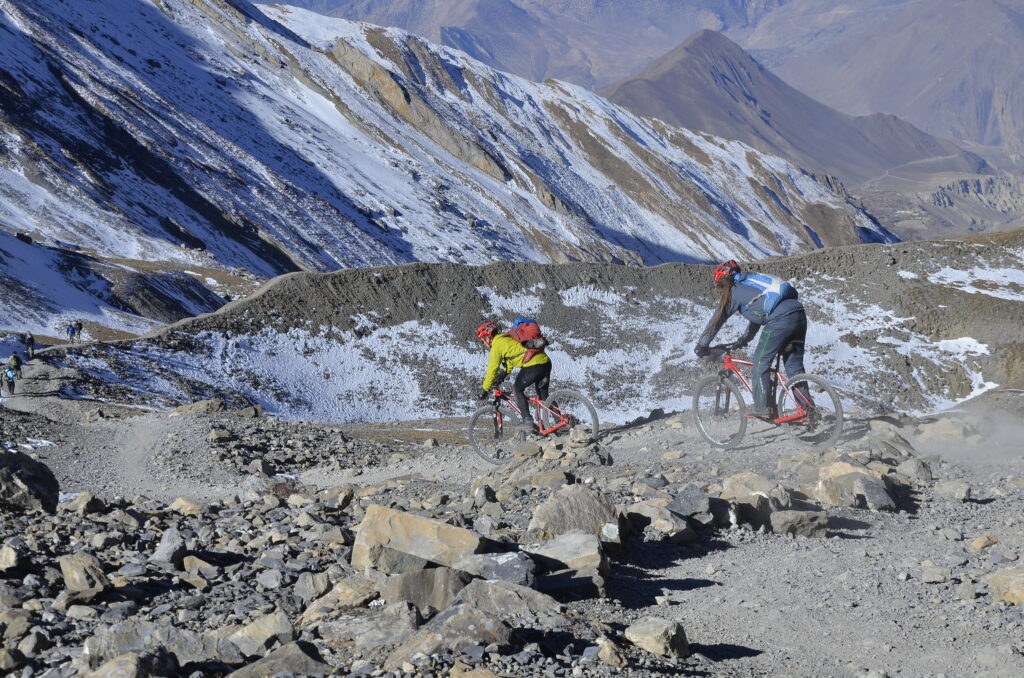 Descending Thorong La on a mountain bike