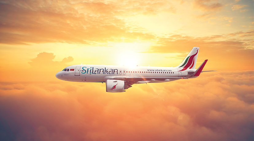SriLankan Airlines plane in the sunny sky
